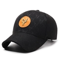 Schwarze Jacquard-Baseballkappe mit orangem Lederpatch und Metall-Emblem-Detail - Schwarz