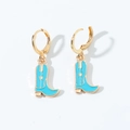 Detail of gold-tone western cowboy boot earrings with blue enamel and star accents - Hoop Earrings / Blue