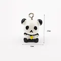Detailed view of 16mm x 22mm panda enamel charm with yellow bow for jewelry making - Panda