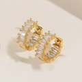Detailed macro view of gold-plated huggie earrings set with rectangular zirconias - Gold Rectangular Zirconia Pave