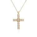 Macro shot of gold plated cross pendant with square and round cubic zirconia stones - Clear Zirconia