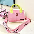 Detail of pink and green contrast crossbody bag with broad graphic strap and P logo - Pink
