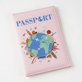Close-up of a pink passport cover with colorful world map and famous global landmarks - 14×10cm / Pink