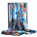 Detail of satin scarf with vibrant zebra and floral patterns on a hanging frame - 90*90cm / Zebra