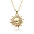 Detailed view of a gold-plated sun pendant necklace featuring shimmering cubic zirconia stones - Sun Disc Style (c541)