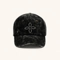 Distressed black acid wash denim baseball cap featuring white cross flower embroidery - Wild Black