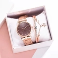 Detail of rose gold Tadi watch with star bracelet set in a premium white gift box - Watch + Bracelet + Gift Box Set / Brown