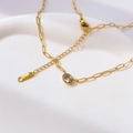 Detail view of gold lobster clasp and K18 engraved tag on the square link chain - Gold-Oval White Zirconia