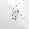 Macro view of silver stainless steel pendant with engraved Padre Nuestro prayer and relief - Steel Square Mary Relief + Spanish Lord's Prayer / Style 2 Steel Color Virgin Mary