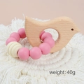 Pink silicone and beech wood bird teether bracelet for infant soothing and teething - Bird/Pink Beads