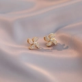 Elegant gold-plated windmill stud earrings with sparkling white zirconia stones - Windmill Earrings (E0002) / Gold