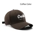 Coffee brown baseball cap featuring 3D white embroidery of Create NEW LIFE text - Adjustable / Brown