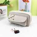 Creamy white canvas pencil case featuring a cross-rope decoration and large opening design - Beige