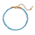 Detail of blue apatite beads with 18K gold-plated clasp and K18 hallmark tag - Larimar Apatite