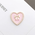 Detailed view of pink enamel heart charm with gold bow and white faux pearls inlay - Enamel Pearl Heart / Pink
