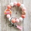 Pink and white silicone beaded keychain wristlet with a Star Groovy rainbow pendant - 1 (Star Groovy Pink)