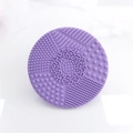 Purple silicone makeup brush cleaning mat with textured surface in a round shape - Round Shape / Purple