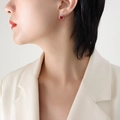 French style heart stud earrings with red zircon stones and golden plating on model - Silver Red Zircon Earrings