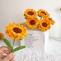 Detailed close-up of a handmade chenille stem sunflower bouquet in a paper gift bag - Finished Sunflower
