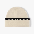 Chique crème en zwarte gebreide muts met contrasterende zigzag gehaakte randdetails - Eén maat / Beige