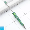 DIY plastic beaded pen with green barrel featuring festive Christmas tree and snowflake patterns - Christmas Green Type 2 (114)