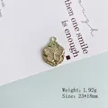 Macro detail of a gold butterfly pendant with rhinestones on a hammered metal disc - 9# Gold Rhinestone Butterfly