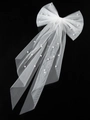 Detail of white tulle bridal bow hair clip with scattered pearls on black background - Single Layer Beveled Pearl Clip / White