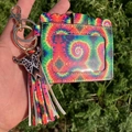 Colorful tie-dye PU leather coin purse featuring a stylish tassel and bull head charm - Red Tie-dye