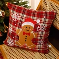 Festive red plaid pillow with embroidered gingerbread man and snowflakes on a chair - Gingerbread Man - Pillowcase (No Core)