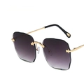 Gafas de sol sin montura con lentes degradadas violetas y patillas de metal dorado - Degradado Gris