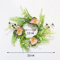 Detail shot of a 33cm floral wreath with pink wildflowers and size markings - Pink