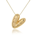 Close-up of golden heart pendant with inset crystals on a box chain necklace - Letter V