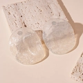 Detailed view of pearlescent resin irregular disc pendants on a textured stone base - Silver Earring Post-White
