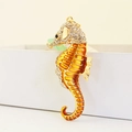Portachiavi a forma di cavalluccio marino dorato con smalto arancione e strass di cristallo - Oro