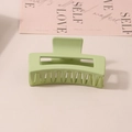 Matte light green rectangular hair claw clip for thick hair shown on a studio background - #19 Matte Light Green - 8.5cm / Bulk (No Packaging)