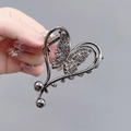 Elegant butterfly claw clip in gunmetal grey finish with sparkling rhinestone details - Heart Butterfly Gun Black