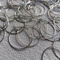 Silver S925 sterling silver hoop earrings set in a stack on textured fabric - 25mm / White Gold