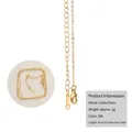 Detailed macro view of 18k gold O-chain necklace with lobster clasp and extension link - 18k O-link + Sheet Extension (50CM)