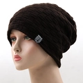 Detail of dark brown knit beanie with diamond pattern texture and animal logo patch - One Size / Coffee