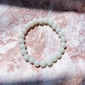 Handmade white turquoise wooden bead bracelet with cross charm on floral pattern fabric - Pure White Crystal Bead Bracelet
