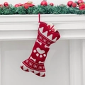 Red and white knitted bone-shaped Christmas stocking with white dog paw prints - Knitted Snowflake Bone Style / Snowflake and Paw Pattern