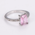 Detail of pink rectangular zircon ring with micro-diamonds on silver stainless steel band - US 7