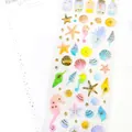 Ocean themed crystal resin stickers with sea stars and glitter for DIY journaling - Seahorse Conch