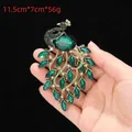 Golden peacock brooch with green crystals and oversized emerald main stone, 11.5cm x 7cm - DW0036 Peacock / 11.5cm*7cm / Green