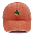 Close-up of green cactus embroidery on vintage washed orange cotton baseball cap - Orange