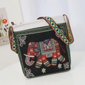 Canvas crossbody bag with elephant embroidery and colorful woven strap in black and beige - Black Elephant