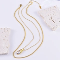 Double-layer gold necklace with colorful teardrop crystal pendant and beaded chain links - Water Drop