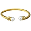 Minimalist twisted cable stainless steel bangle featuring two white pearls on a gold finish - Gold