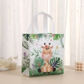 Detail of non-woven gift bag featuring a cute cartoon giraffe and tropical leaf print - 2010-2 Giraffe / 23*22*11cm