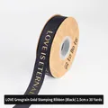 Black 2.5cm ribbed ribbon with gold LOVE IS ETERNAL lettering for floral bouquet gift wrapping - 2.5cm Wide x 30 Yards Long / Black